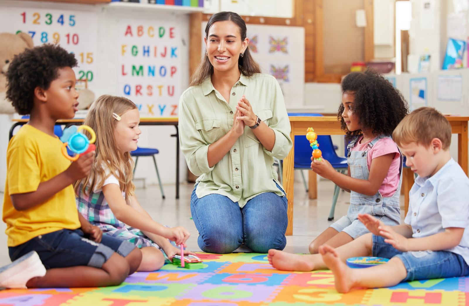 Teacher engaging with children in circle time